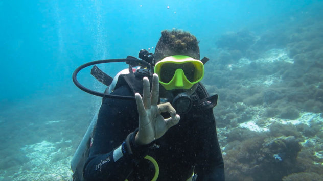 This diving hand signal is used to ask if a diver is OK. The OK hand signal is the most common diving hand signal that is used